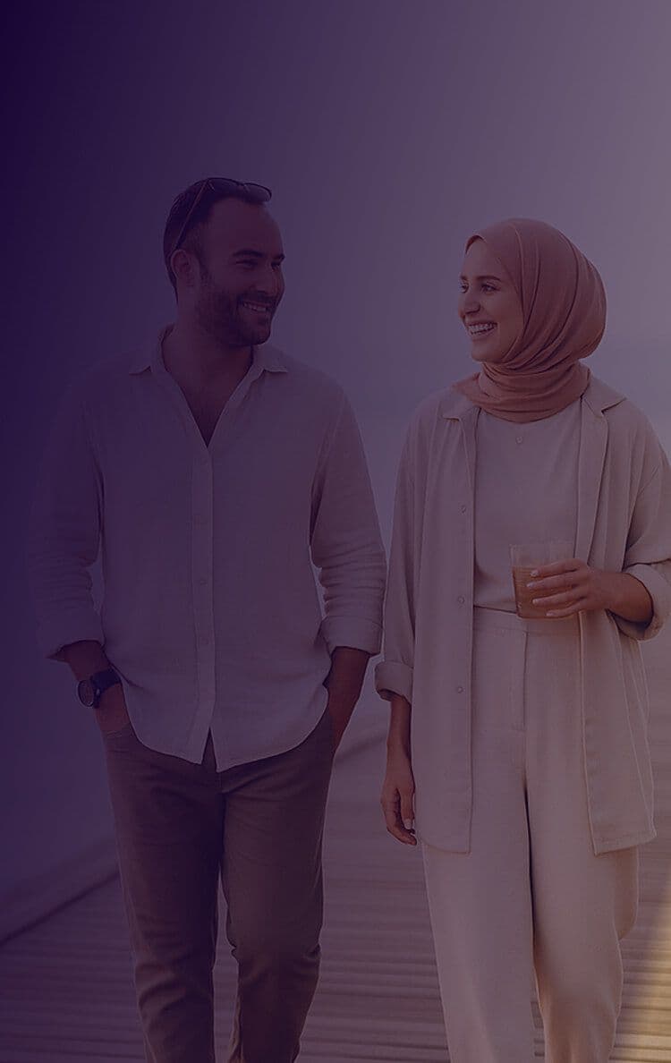 Couple walking and smiling